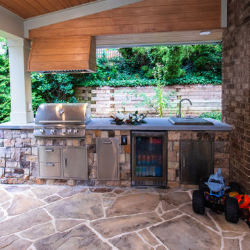 Compact Covered Outdoor Kitchen with Grill and Beverage Fridge