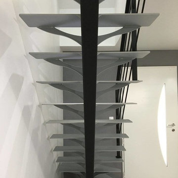 Escalier limon central métal