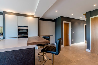 This is an example of a contemporary kitchen in Cheshire.