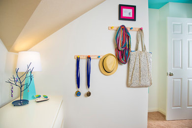 Example of a mid-sized eclectic girl carpeted and beige floor kids' room design in Indianapolis with white walls