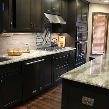 DuraSupreme Peppercorn Kitchen With Cambria Tops and Black Stainless Appliances