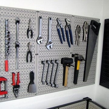 Wall Control metal pegboard being used in conjunction with shadow tape to create
