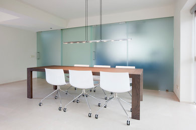 Example of a trendy dining room design in Amsterdam