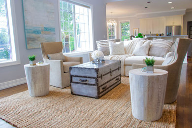 Inspiration for a mid-sized coastal formal and open concept dark wood floor living room remodel in Other with gray walls, no fireplace and no tv