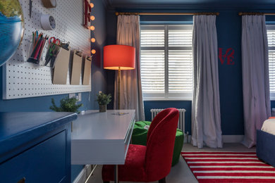 This is an example of a large contemporary kids' room for girls in Other with blue walls, carpet and grey floor.