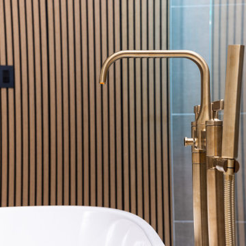 Elegant master bathroom with large format tile