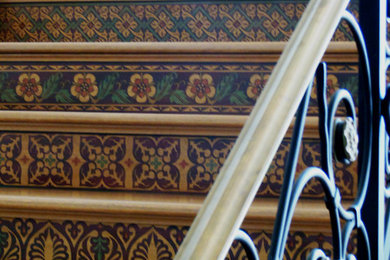Inspiration for a mediterranean staircase remodel in San Diego with wooden risers
