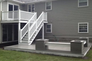 Mid-sized elegant backyard deck photo in Boston with no cover