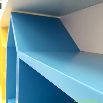 Ristrutturazione e realizzazione di negozio di abbigliamento bambini