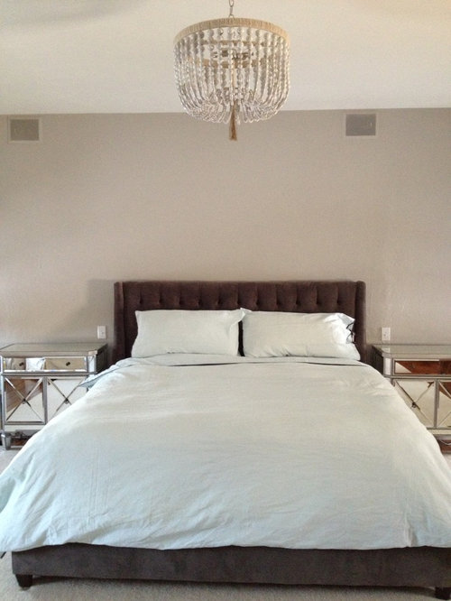 What to hang above headboard? Large wall needs a pop!!