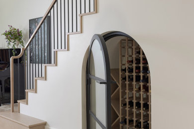 Example of a transitional wine cellar design in San Francisco