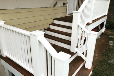 Mid-sized elegant wood railing staircase photo in Portland