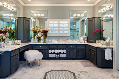 Example of a 1960s marble floor and white floor bathroom design in Houston with white walls, marble countertops and white countertops