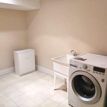 L - shape laundry room. 7 ft by 11 ft