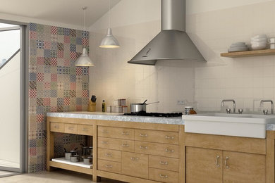 Enclosed kitchen - mid-sized transitional single-wall travertine floor and beige floor enclosed kitchen idea in Dallas with a farmhouse sink, flat-panel cabinets, light wood cabinets, marble countertops, white backsplash, porcelain backsplash, stainless steel appliances and no island