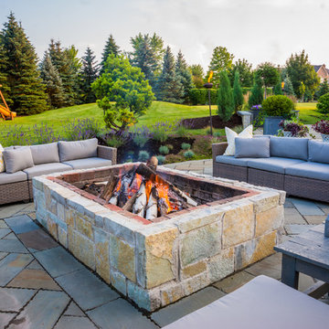 Entertain in this Backyard Landscape with Patio & Firepit: Perfect for Families!