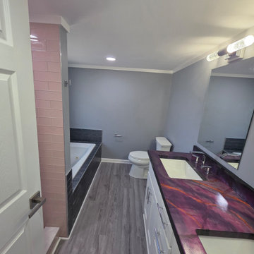 Complete Bathroom Renovation with Bold Vanity and Grey Walls