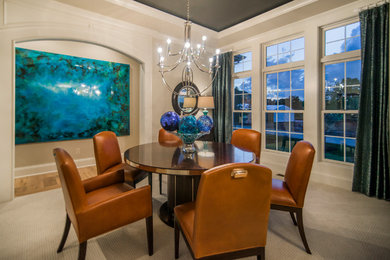 Example of a mid-sized transitional carpeted and beige floor enclosed dining room design in Columbus with beige walls and no fireplace