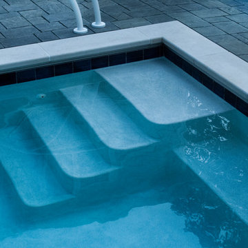 Northbrook, IL Compact Pool with Cover, Fire Pit and Swim Resistance Machine