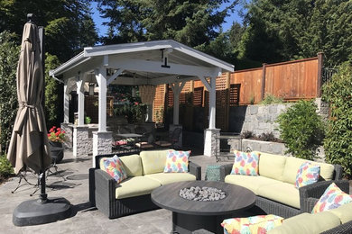 Photo of a mid-sized arts and crafts backyard patio in Vancouver.