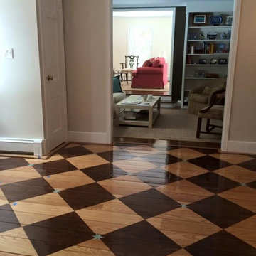 Foyer with checkerboard stained floor with hand painted blue accent stars