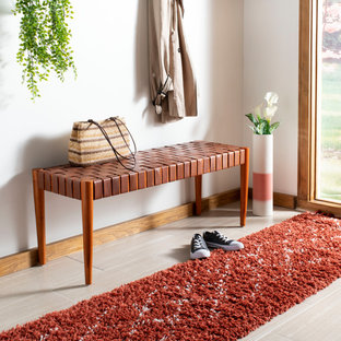 Inspiration for an eclectic entryway in New York.