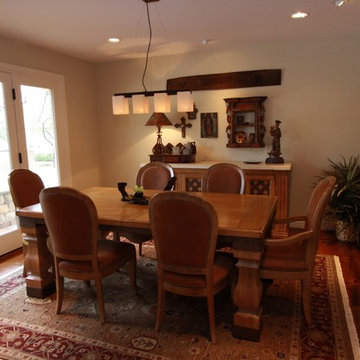 The Dining Room features Mexican religious relics, antique Peruvian wall niche,
