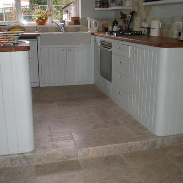 Kitchen with travertine tiled floor