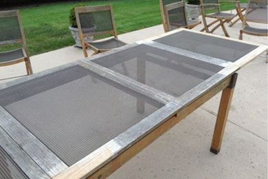 Patio kitchen - concrete patio kitchen idea in Detroit with no cover