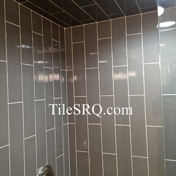 4X16 Ceramic tile installed in a vertical running bond in a master shower