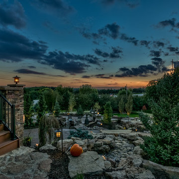 Custom Rock Formations and Stone Patio in Rocky Mountain Garden