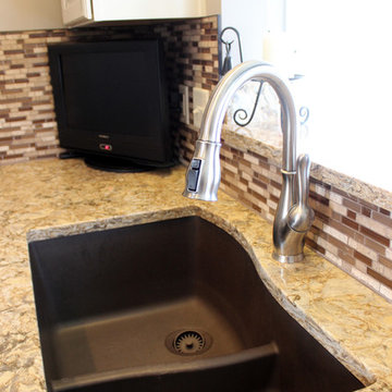 Cream Kitchen with Contrasting Dark Island with Quartz Countertop