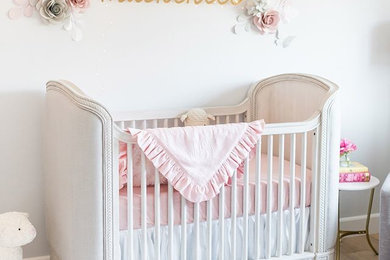 Example of a classic girl nursery design in Jacksonville