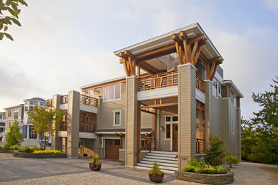 Inspiration for a transitional wood duplex exterior remodel in Philadelphia