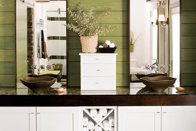Mid-sized trendy master porcelain tile bathroom photo in Chicago with shaker cabinets, white cabinets, green walls, a vessel sink and glass countertops