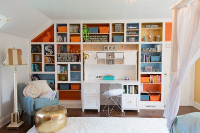 Inspiration for a mid-sized timeless girl dark wood floor kids' room remodel in Philadelphia with multicolored walls