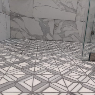 Marble and espresso bathroom