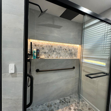 Modern Walk-In Shower Remodel with LED Niche and Custom Tile Design