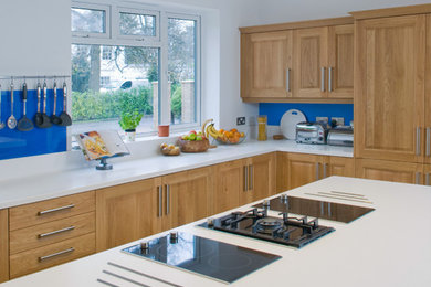 Design ideas for a large modern kitchen in Surrey.
