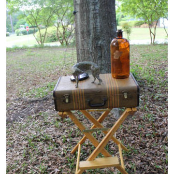 Repurposed vintage suitcase becomes beautiful hall table