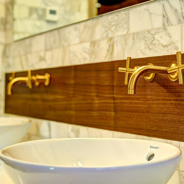 Vessel Sink with Brass Faucets and Floating Wood Details
