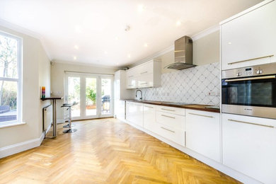 Photo of a medium sized contemporary kitchen in London.