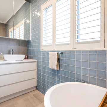 Laundry/ Bathroom with Antaro White Drawers and Pure white Caersarstone