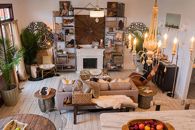 Inspiration for a formal and open concept light wood floor living room remodel in Other with white walls and a standard fireplace
