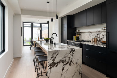 Example of a trendy kitchen design in Toronto