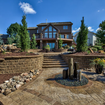 Rocky Mountain Garden Rock Formations, Steps, and Patio Beneath Trees and Plants