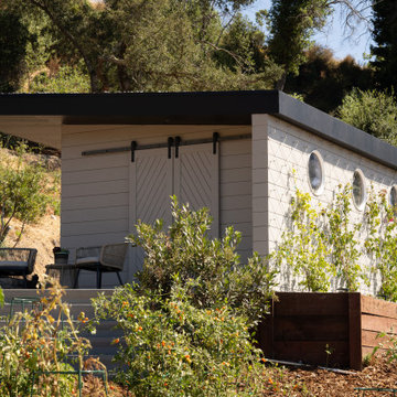 A little farm below a hillside resort-style off-the-grid view home