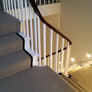 Lighting gives this staircase a more luxurious feel