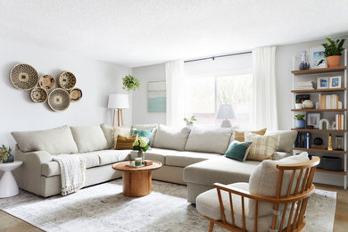 Inspiration for a mid-sized transitional open concept ceramic tile and brown floor living room remodel in Los Angeles with gray walls