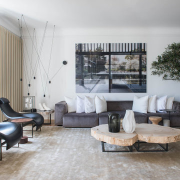 Casa da Moeda living room with chaise sofa and indoor tree